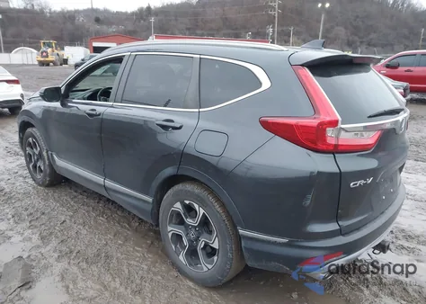 2017 Honda Cr-V Touring z USA, uszkodzony, nr VIN 5J6RW2H98HL032123
